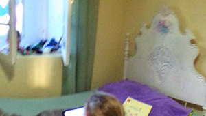 Xavier takes a photo of Carmen's Room